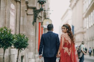 Nri girl with groom looking back